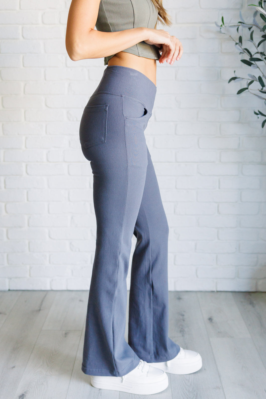 Building Habits Twill Flared Crossover Waist Pant in TitaniumBuild strong style with our Twill Flared Crossover Waist Pant in Titanium. The medium stretch fabric molds to your curves while the unique V-waistline, functional frAve ShopsLavender Life BoutiqueBuilding Habits Twill Flared Crossover Waist PantBottoms