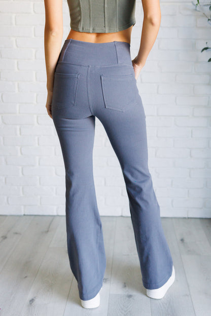 Building Habits Twill Flared Crossover Waist Pant in TitaniumBuild strong style with our Twill Flared Crossover Waist Pant in Titanium. The medium stretch fabric molds to your curves while the unique V-waistline, functional frAve ShopsLavender Life BoutiqueBuilding Habits Twill Flared Crossover Waist PantBottoms