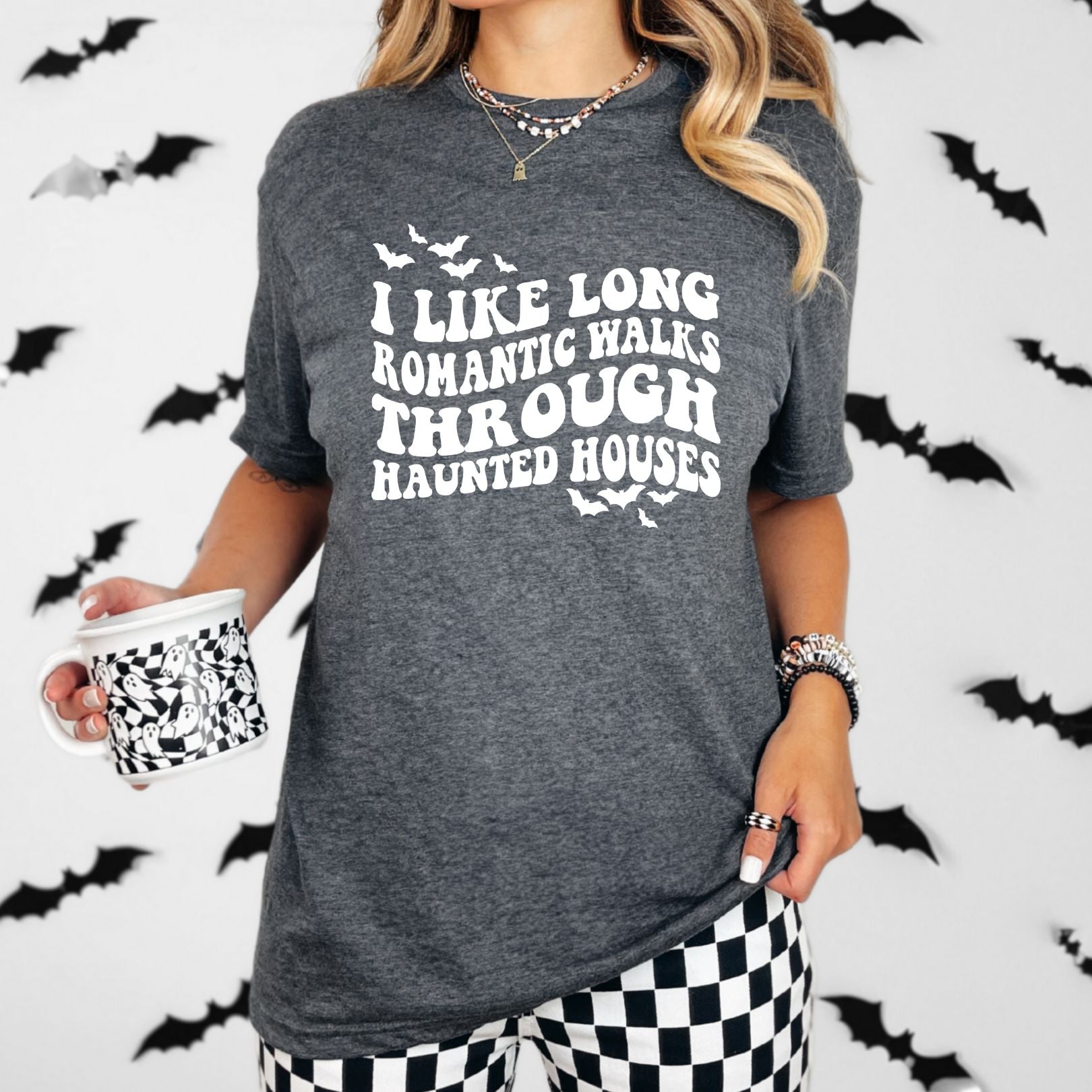 Long Haunted Walks Graphic TeeGraphic tees will ship 5-7 business days after the order is received and will ship separately from other items placed in the same order! 

Gildan - Dark grey tee witAve ShopsLavender Life BoutiqueLong Haunted Walks Graphic TeeWomens